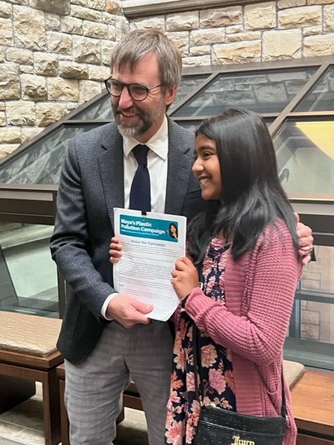 Photo of Maya Thiru and Steven Guilbeault, Minister of Environment and Climate Change of Canada. In June 2023, Maya was invited to meet Minister Guilbeault to discuss Maya's Plastic Pollution Campaign to ban PLU stickers.